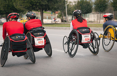 Wheelchair athletes racing on the road